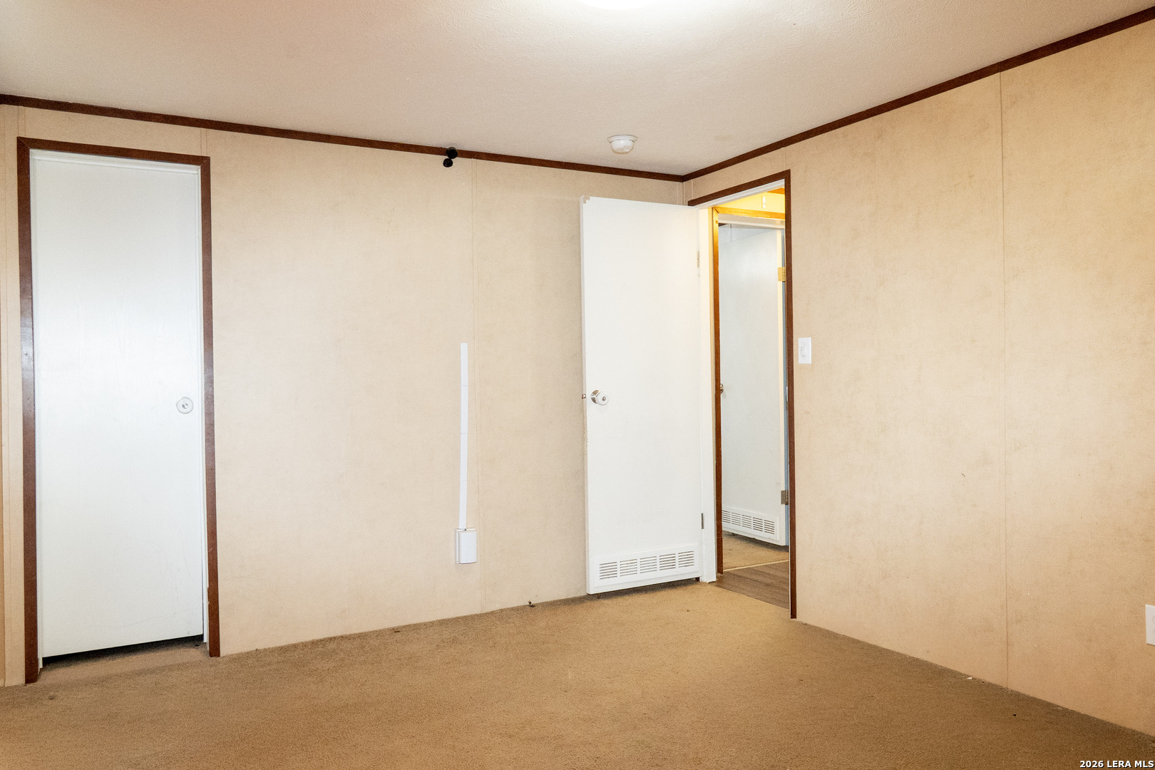 507 Beech Street Jourdanton, TX 78026 - Photo 12 of 17 a view of an empty room