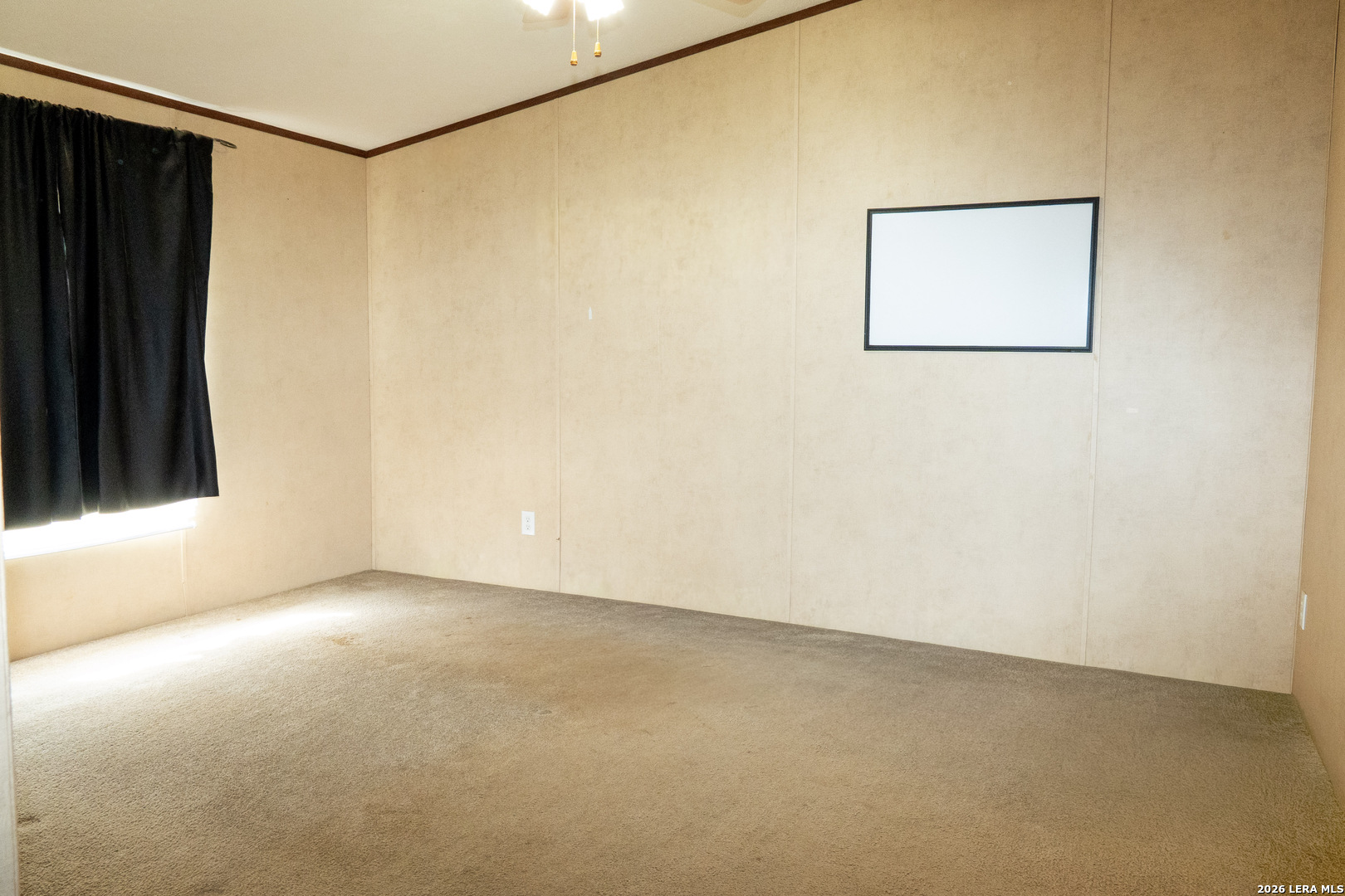 507 Beech Street Jourdanton, TX 78026 - Photo 6 of 17 a view of an empty room