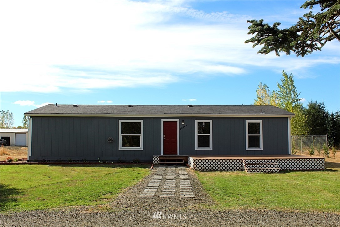 18445 Forstrom Street Southwest Rochester, WA 98579 - Photo 4 of 14 front view of a house with a yard