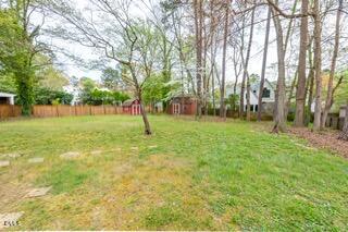 408 Ortega Road Raleigh, NC 27609 - Photo 22 of 25 a view of a park with large trees