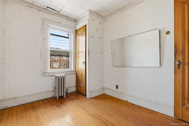 $779,000 | 61-24 65th Street | Middle Village