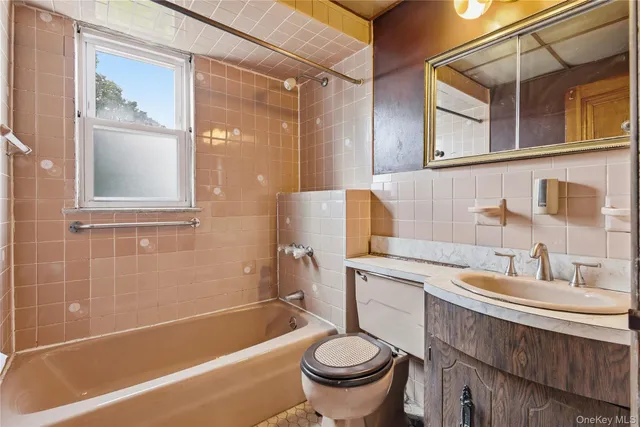 $779,000 | 61-24 65th Street | Middle Village