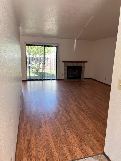 239 Mortimer Lane Marina, CA 93933 - Photo 25 of 87 an empty room with wooden floor and windows