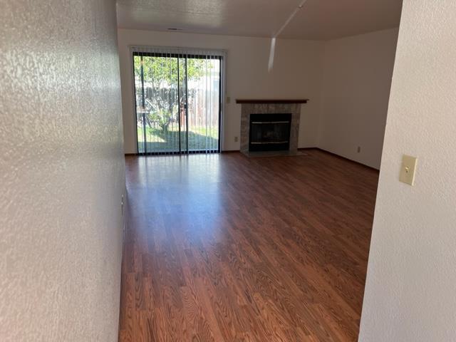 239 Mortimer Lane Marina, CA 93933 - Photo 27 of 87 wooden floor in an empty room with a window