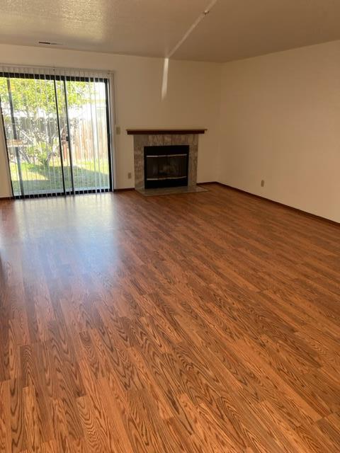 239 Mortimer Lane Marina, CA 93933 - Photo 28 of 87 a view of an empty room with wooden floor and a window