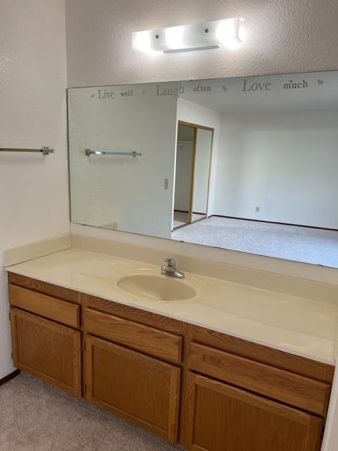 239 Mortimer Lane Marina, CA 93933 - Photo 64 of 87 a bathroom with a sink and a mirror