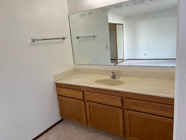 239 Mortimer Lane Marina, CA 93933 - Photo 65 of 87 a bathroom with a sink and a mirror