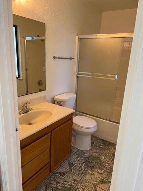 239 Mortimer Lane Marina, CA 93933 - Photo 66 of 87 a bathroom with a granite countertop sink toilet and shower