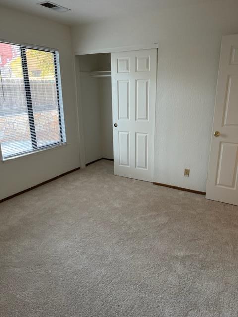 239 Mortimer Lane Marina, CA 93933 - Photo 7 of 87 an empty room with windows and closet