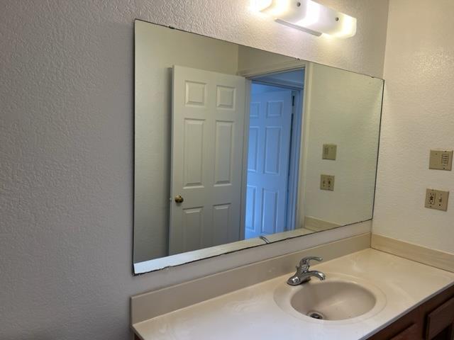 239 Mortimer Lane Marina, CA 93933 - Photo 73 of 87 a bathroom with a sink and a mirror