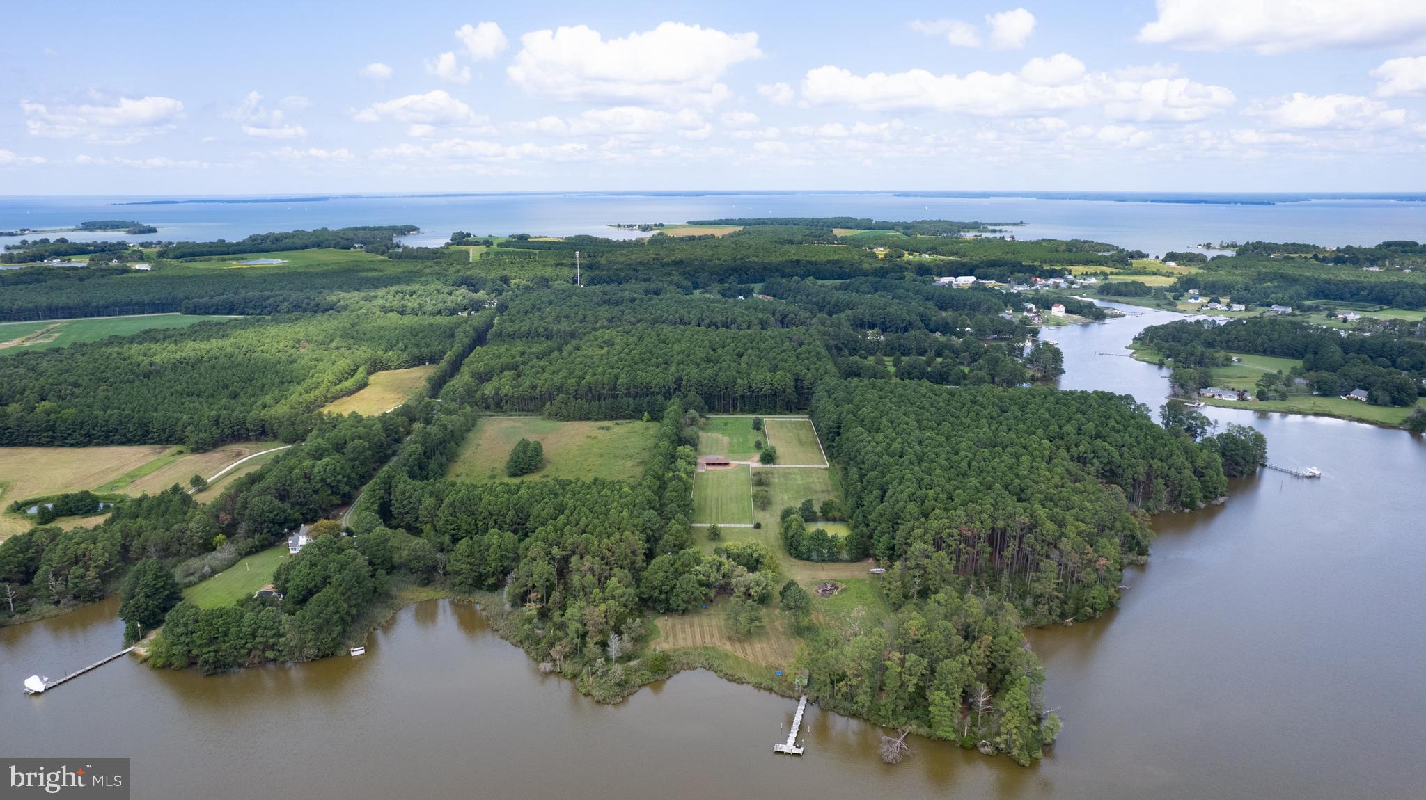an aerial view of a houses with outdoor space and street view