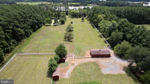 an aerial view of residential house with outdoor space