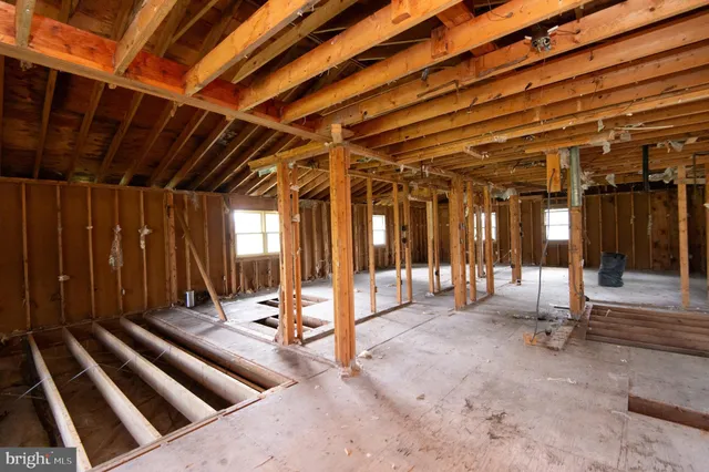 a view of a room with wooden walls