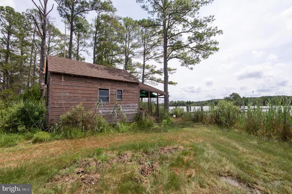 a house view with a backyard space