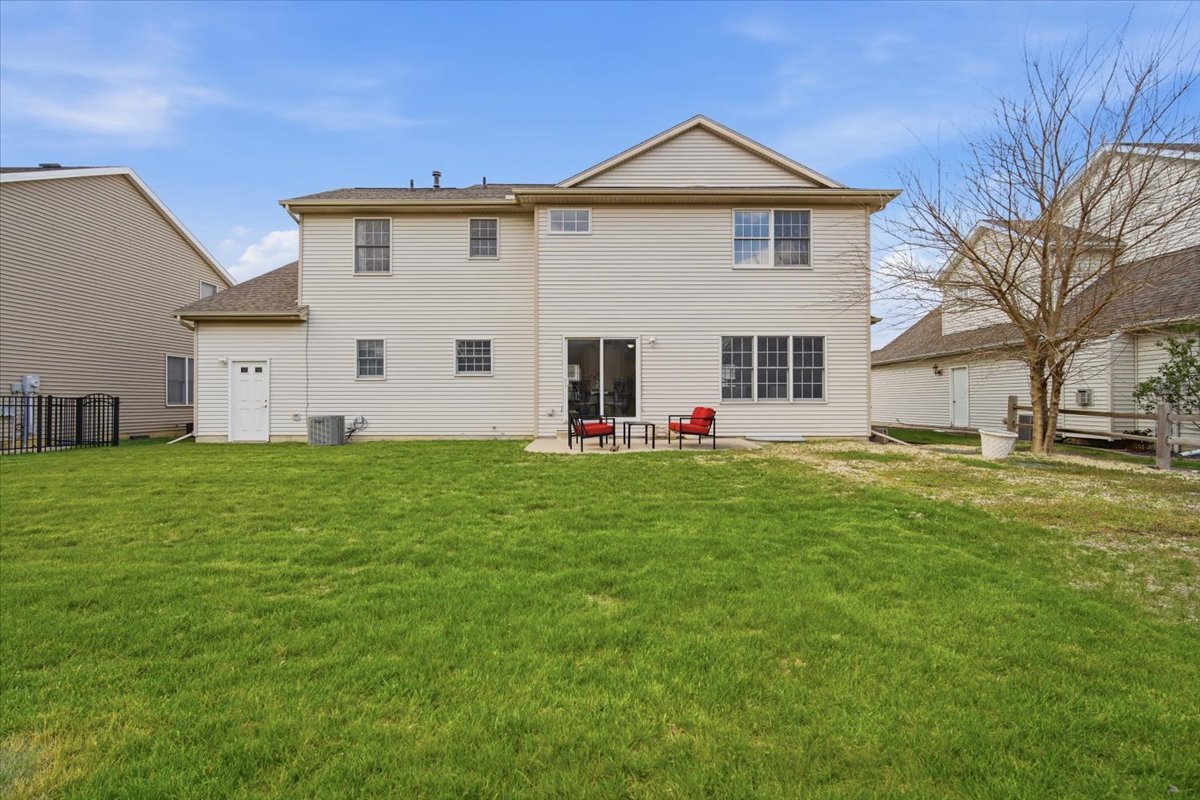3255 Fire Fly Court Normal, IL 61761 - Photo 24 of 25 a front view of house with yard and green space