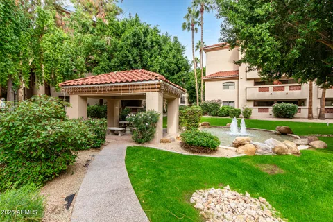a view of house with a garden