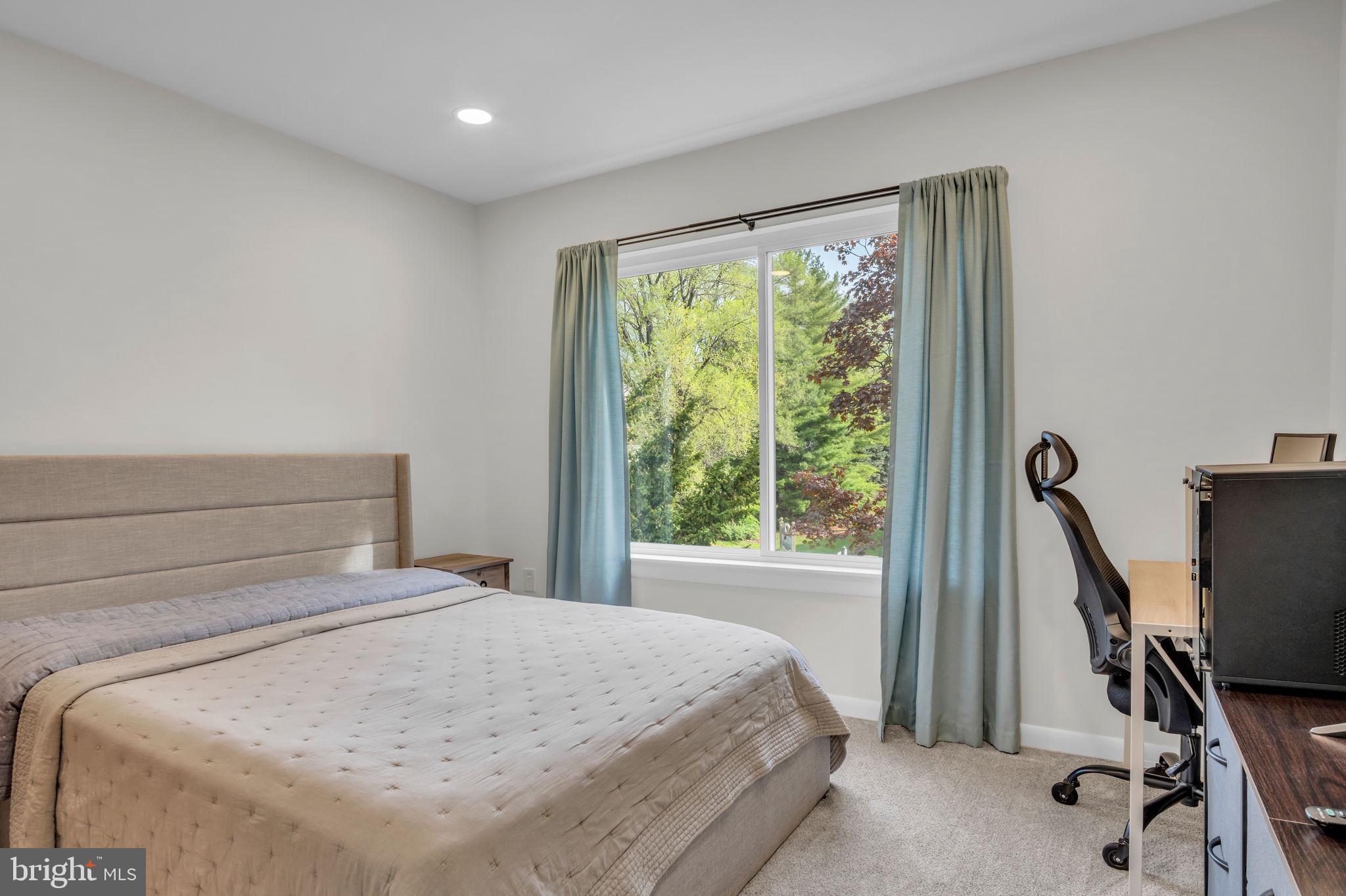 14 Ramsgate Court, Unit 14 York, PA 17404 - Photo 17 of 25 Serene bedroom with nature views.