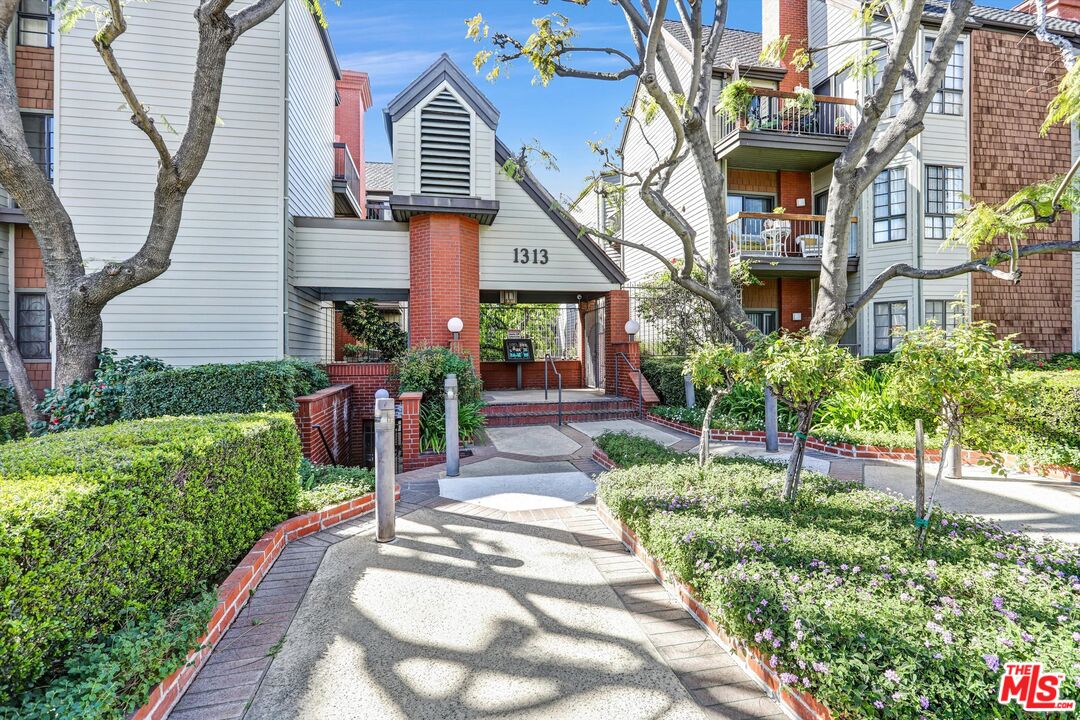 1313 Valley View Road, Unit 213 Glendale, CA 91202 - Photo 1 of 31 a front view of a house with a yard