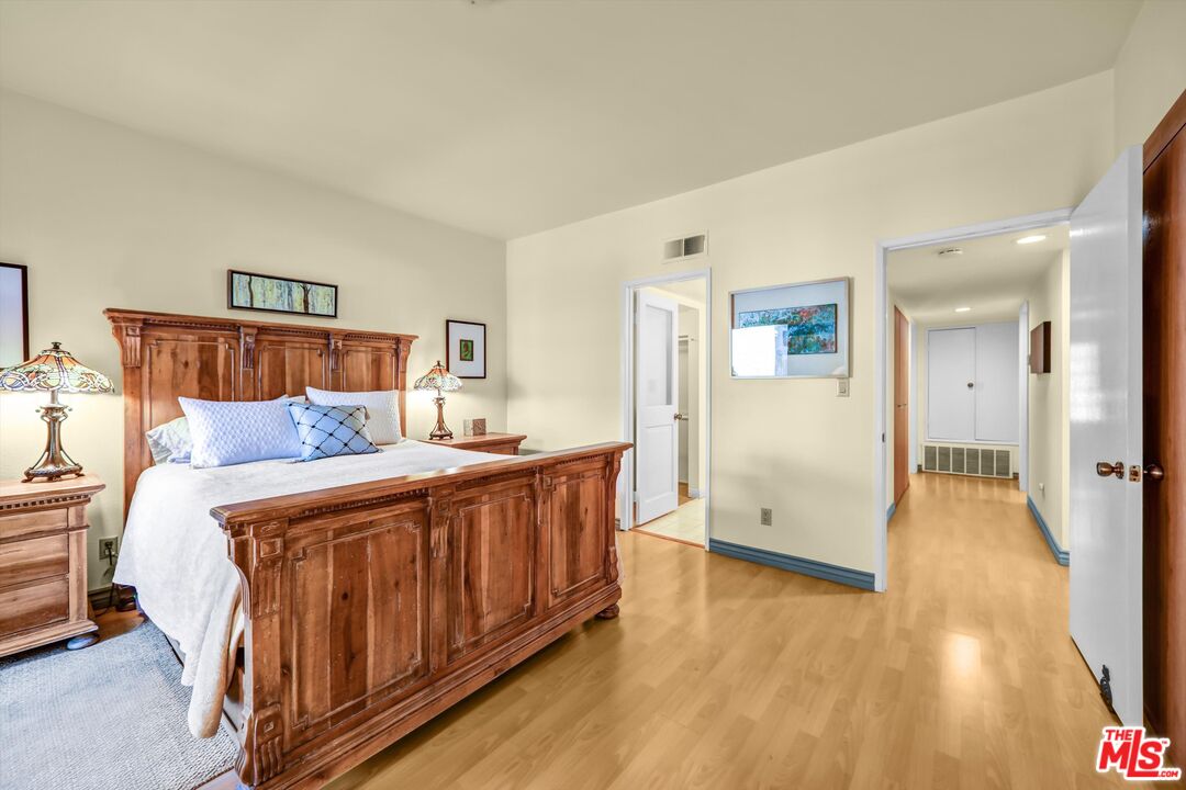 1313 Valley View Road, Unit 213 Glendale, CA 91202 - Photo 18 of 31 a bed room with a bed and a couch