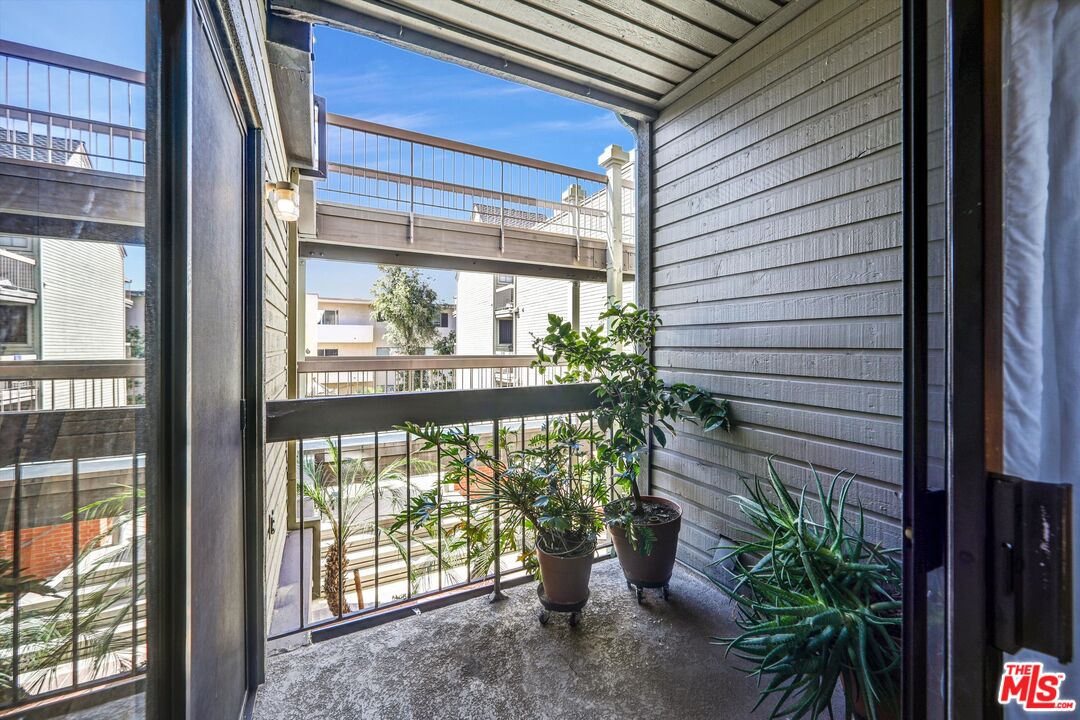 1313 Valley View Road, Unit 213 Glendale, CA 91202 - Photo 19 of 31 a view of a porch with a potted plant