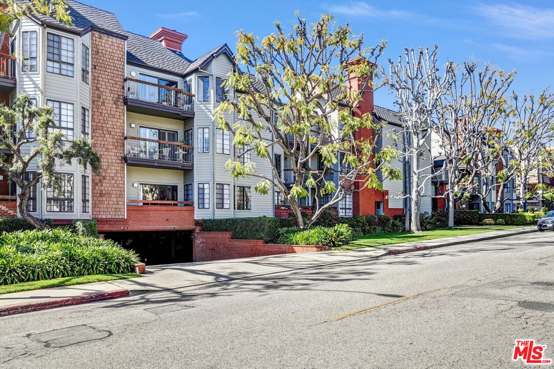 1313 Valley View Road, Unit 213 Glendale, CA 91202 - Photo 2 of 31 a tall building on the side of a street