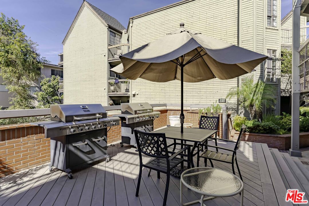 1313 Valley View Road, Unit 213 Glendale, CA 91202 - Photo 26 of 31 a view of a chairs and table in the balcony