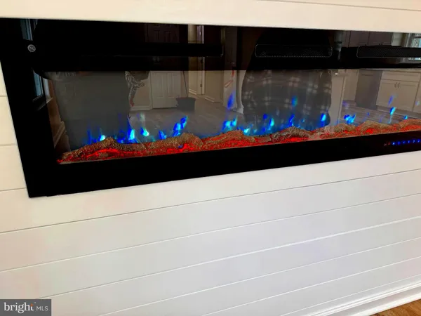 a bathroom with a double vanity and a shower