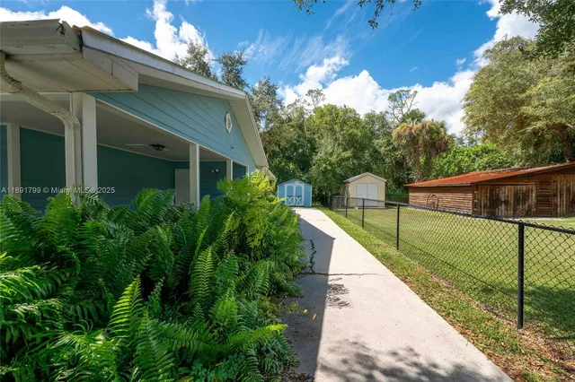 a house view with a outdoor space
