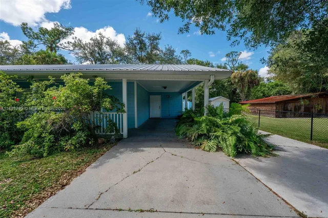 a view of a garden with potted plants
