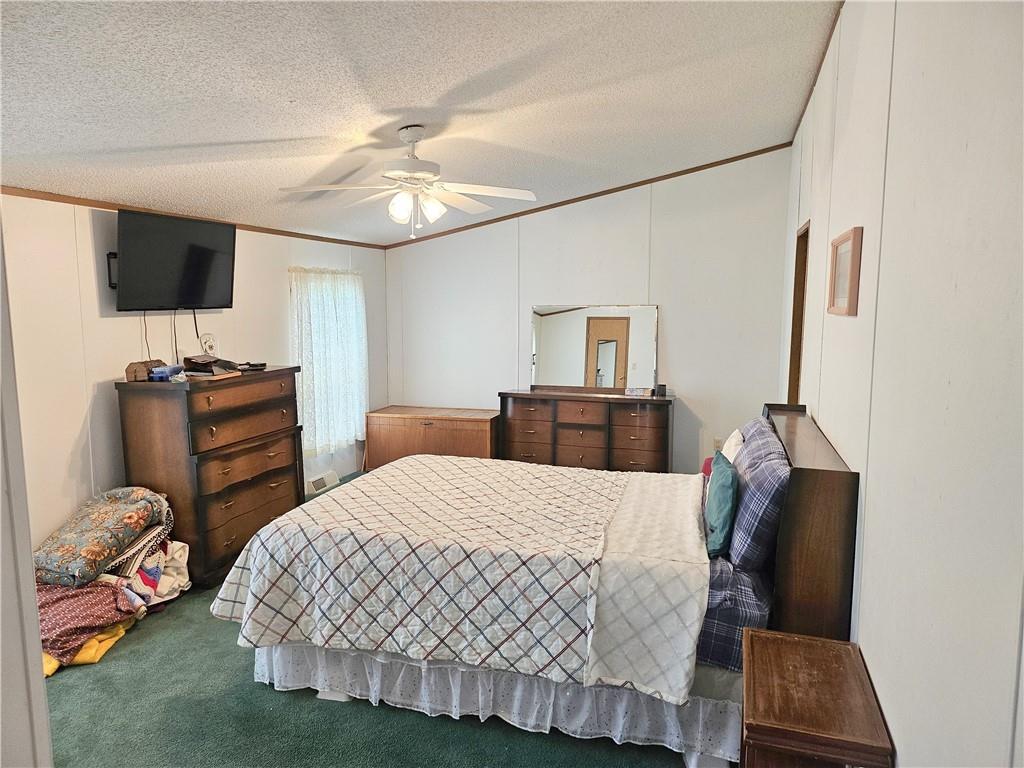 723 Joy Lane Butler, PA 16001 - Photo 20 of 41 a bedroom with a bed and a flat screen tv