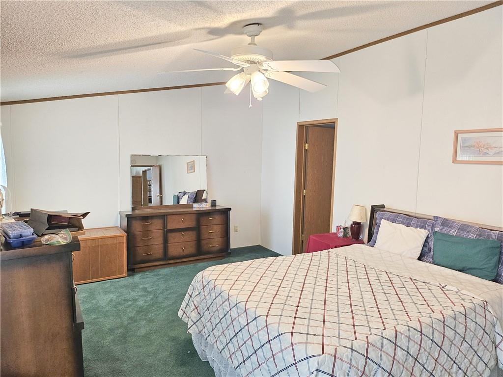 723 Joy Lane Butler, PA 16001 - Photo 21 of 41 a bedroom with a bed and a dresser