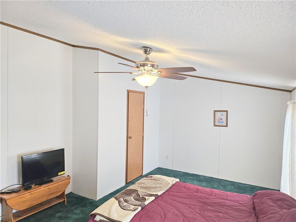 723 Joy Lane Butler, PA 16001 - Photo 29 of 41 a bedroom with a bed and a flat screen tv