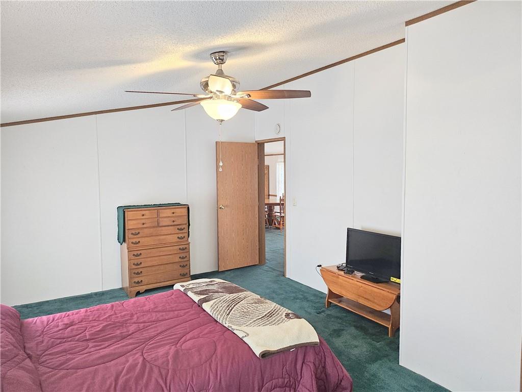 723 Joy Lane Butler, PA 16001 - Photo 30 of 41 a bedroom with a bed and a television