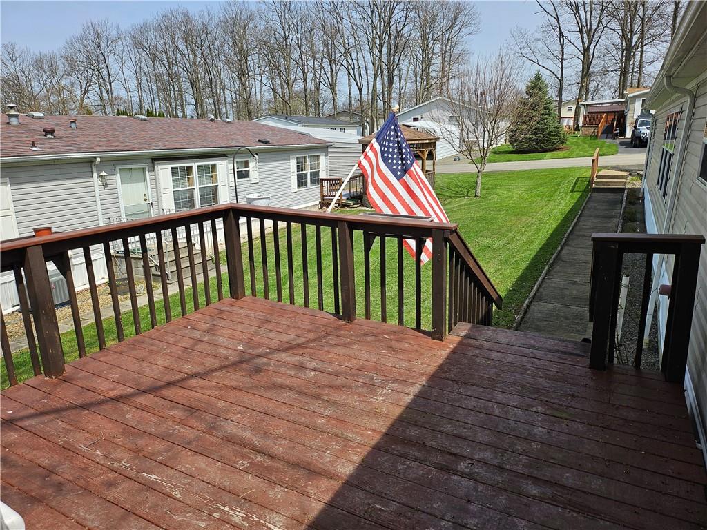 723 Joy Lane Butler, PA 16001 - Photo 38 of 41 a view of a wooden deck and a yard