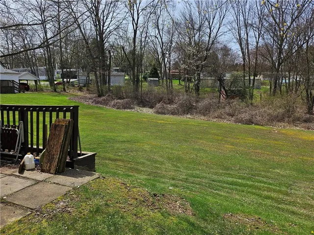 a view of a garden with a slide