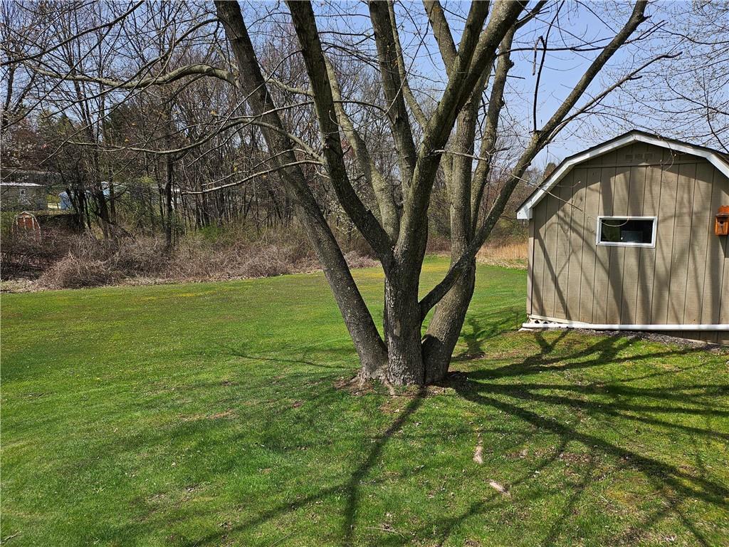 723 Joy Lane Butler, PA 16001 - Photo 4 of 41 a backyard of a house with lots of green space