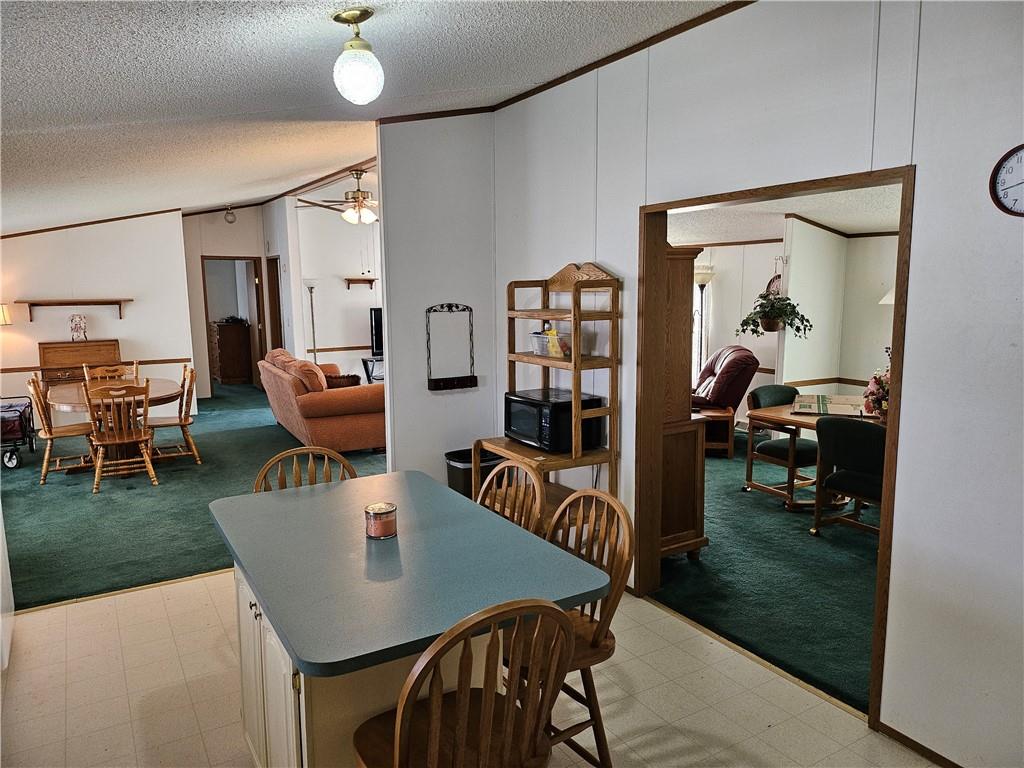723 Joy Lane Butler, PA 16001 - Photo 8 of 41 a view of a dining room with furniture and a livingroom