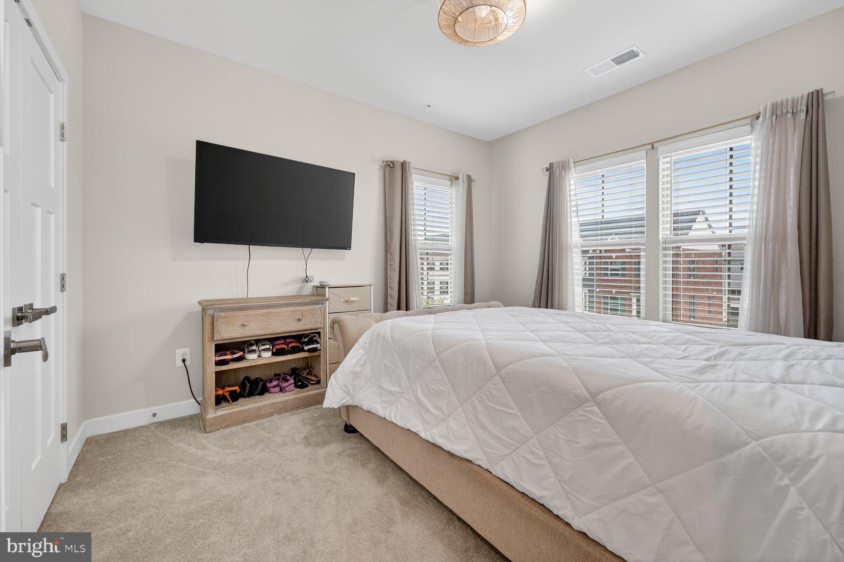 14963 Ring House Road, Unit D Brandywine, MD 20613 - Photo 19 of 31 DREAMY BEDROOM THREE WITH WINDOWED WALL