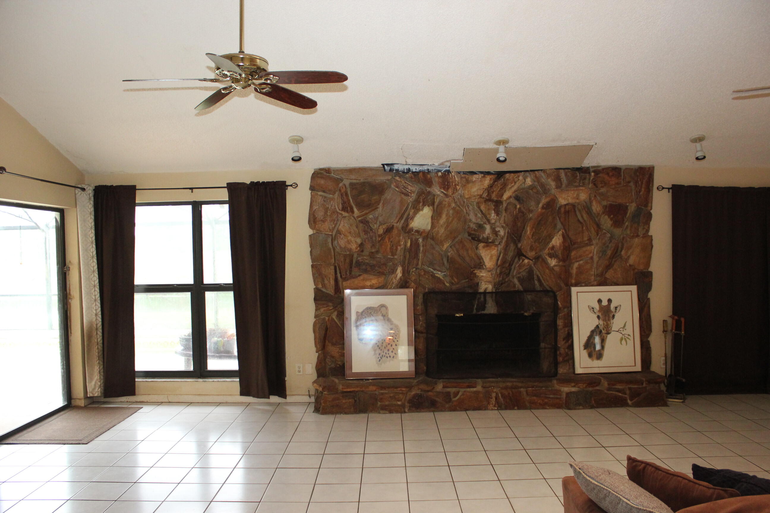 4981 Serafica Drive Lake Worth, FL 33461 - Photo 19 of 44 a view of an empty room with windows