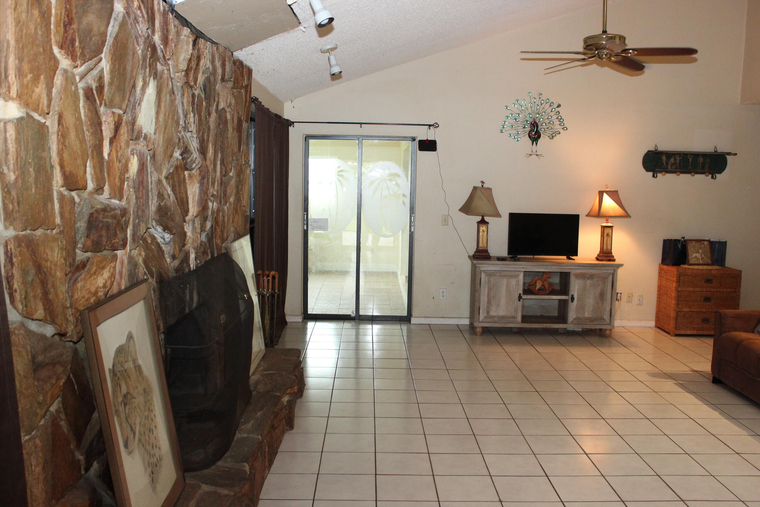 4981 Serafica Drive Lake Worth, FL 33461 - Photo 26 of 44 a view of a storage & utility room with two washing machine