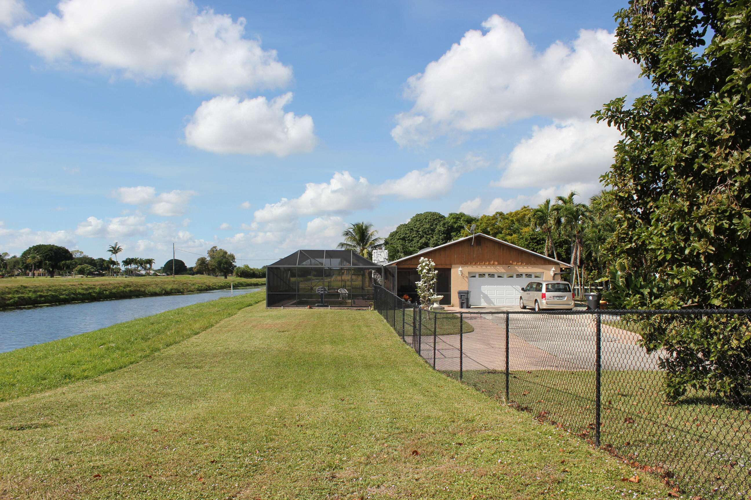 4981 Serafica Drive Lake Worth, FL 33461 - Photo 4 of 44 a view of a house with a yard