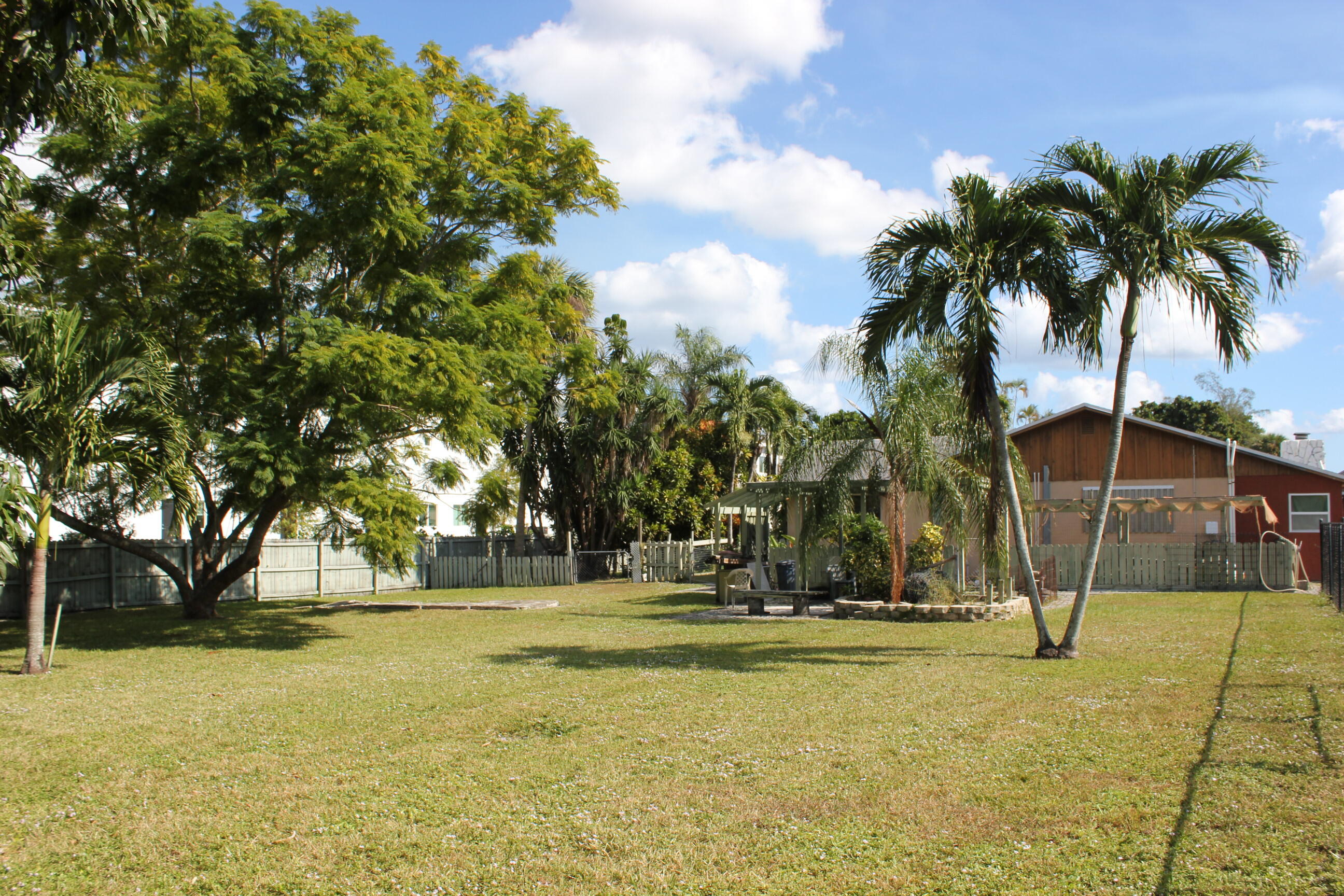 4981 Serafica Drive Lake Worth, FL 33461 - Photo 42 of 44 a view of outdoor space with swimming pool