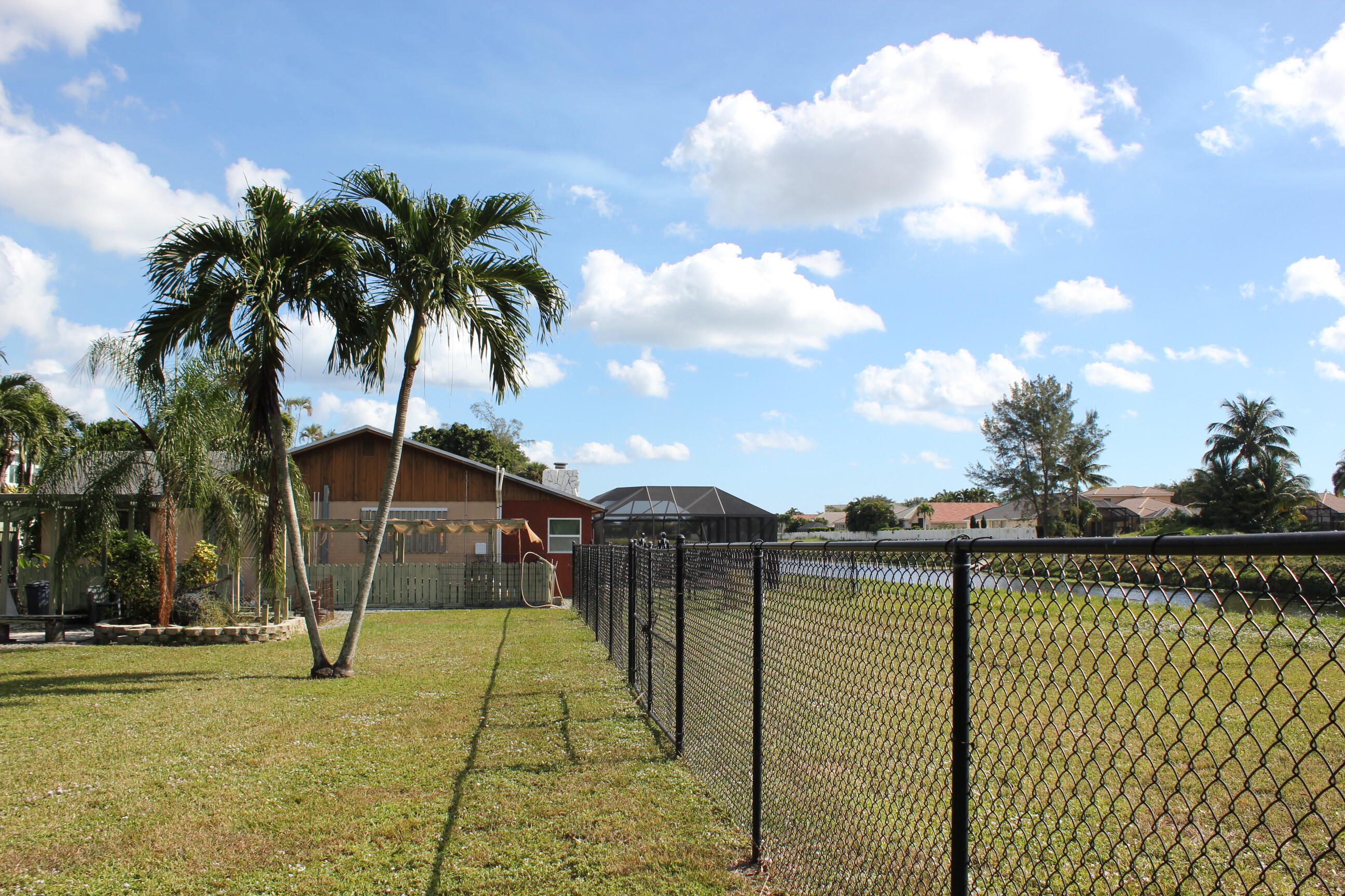 4981 Serafica Drive Lake Worth, FL 33461 - Photo 43 of 44 a view of a garden