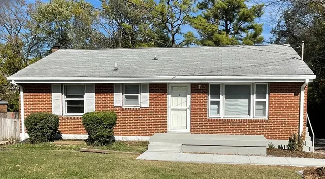 a view of house with outdoor space