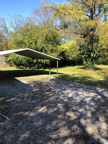 a view of house with outdoor space