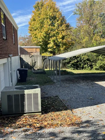 a view of a house with a big yard