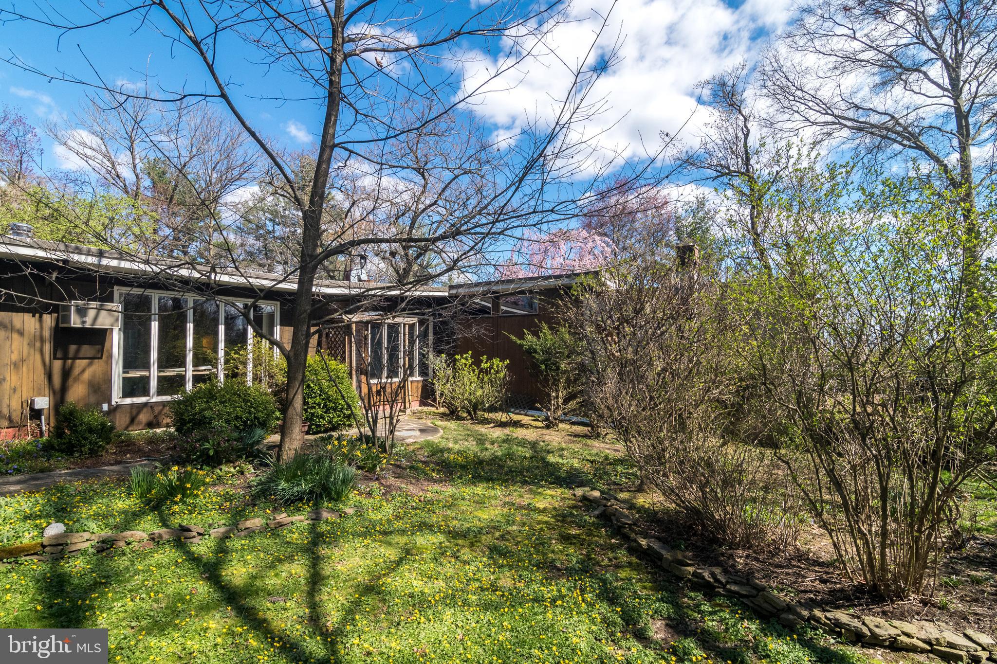 4453 Province Line Road Princeton, NJ 08540 - Photo 15 of 22 a view of house with backyard and garden