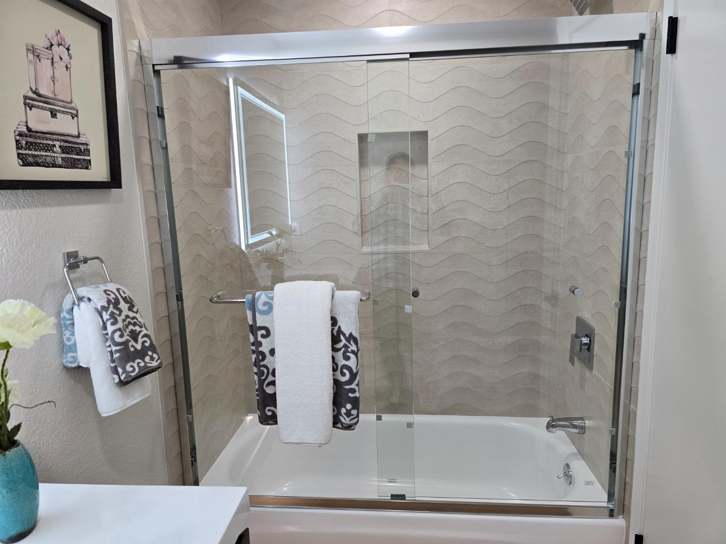 3575 Lehigh Drive, Unit 25 Santa Clara, CA 95051 - Photo 15 of 29 a bathroom with a bathtub and shower