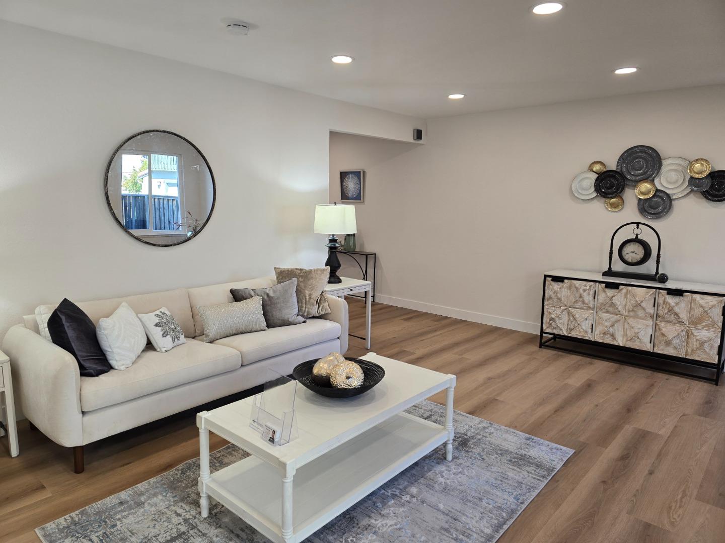 3575 Lehigh Drive, Unit 25 Santa Clara, CA 95051 - Photo 5 of 29 a living room with furniture and a wooden floor
