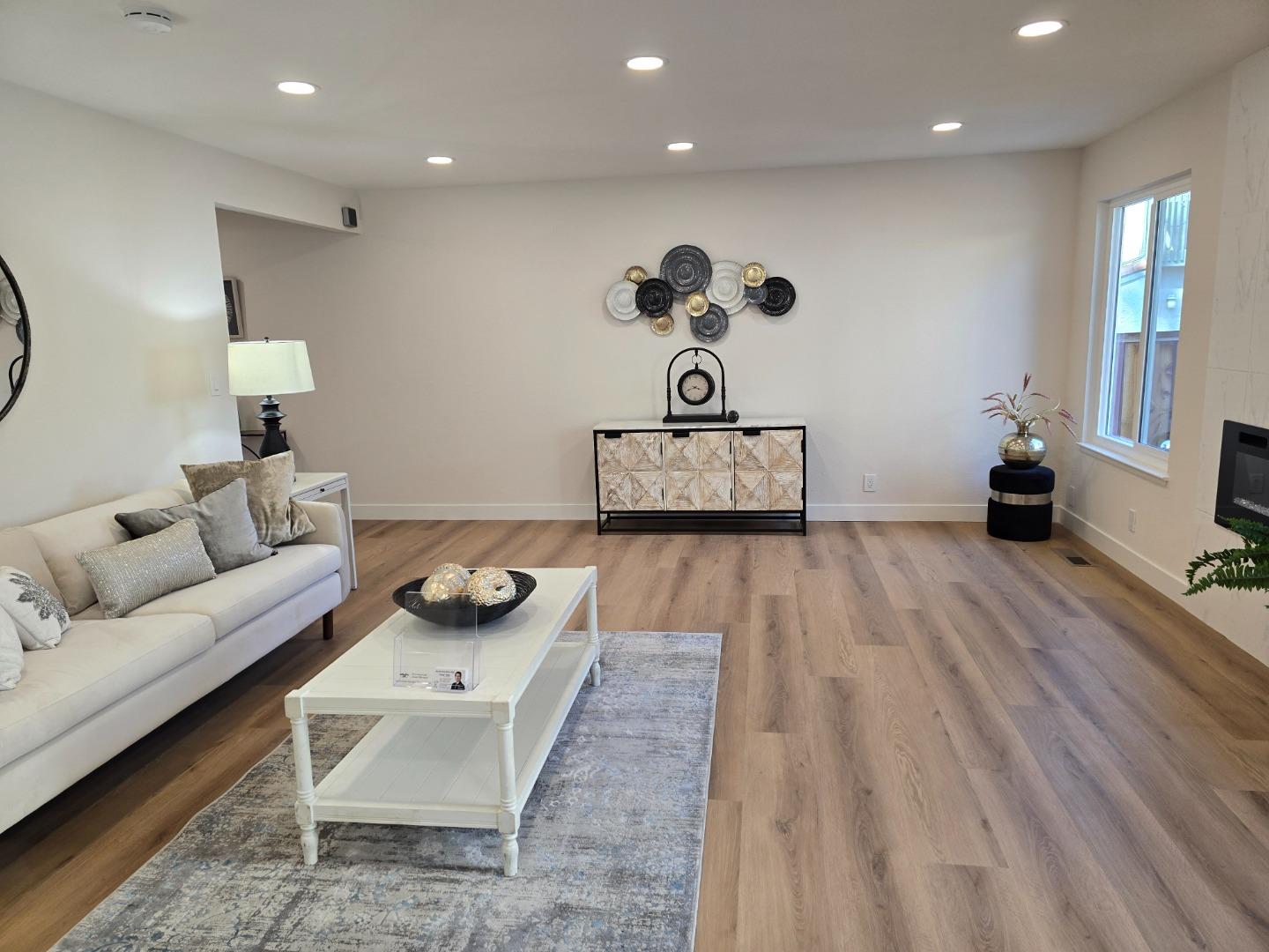 3575 Lehigh Drive, Unit 25 Santa Clara, CA 95051 - Photo 6 of 29 a living room with furniture and wooden floor